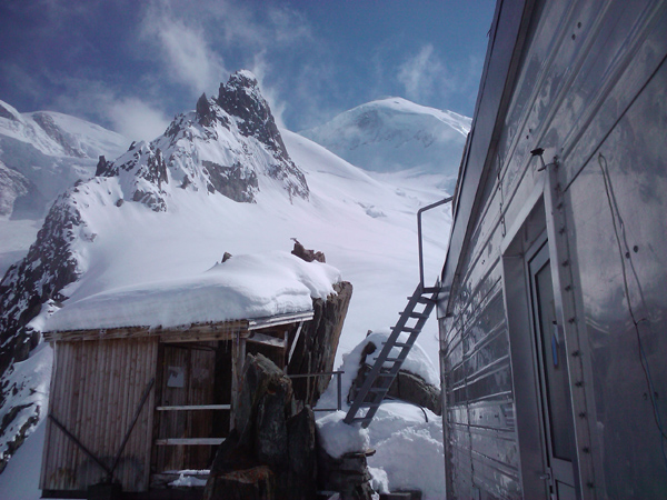 The Gran Mulets hut with the summit of Mont Blanc beyond.