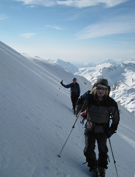 Steep skinning up an icy and cold Viso Mozzo above the Rifugio Quintino Sella.