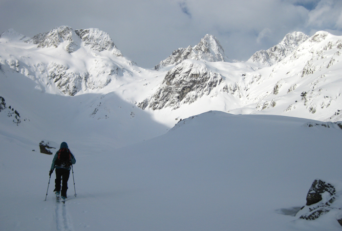 Setting off towards the Pene d'Aragon in the Marcadau valley,  French Pyrenees.  