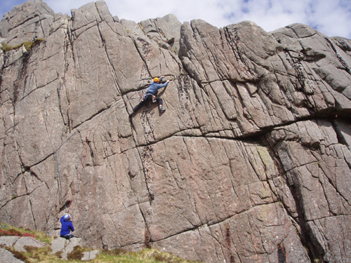 John Biggar on the first ascent of General Dynamics, E1, Memorial Crag, Craignaw