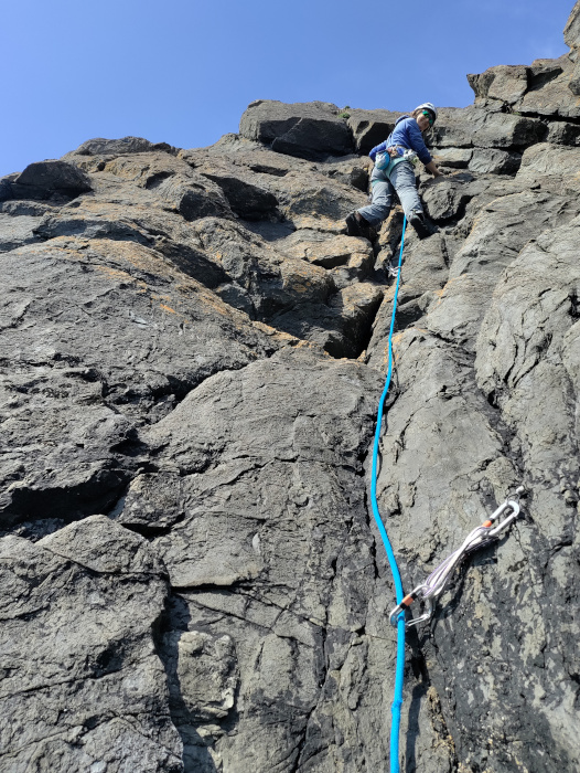 Linda Biggar on teh first ascent of a route at Scart Craig. 
