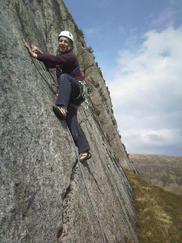 David McNicol leaving the heather behind on the first ascent of Pao de Spout, VS 4c, Cairnsmore of Fleet.