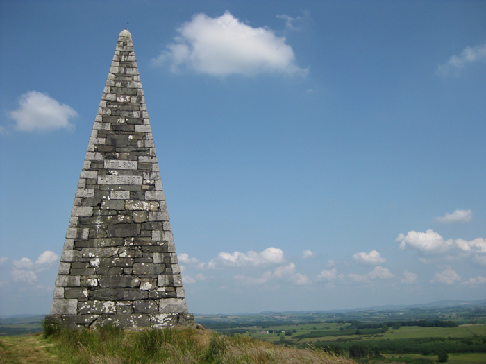 This 10-12m high monument to James Neilson, the inventor of the Hotblast process, makes an unusual ascent. It sits on top of Barstobrick Hill just north of the A75 at Ringford. 