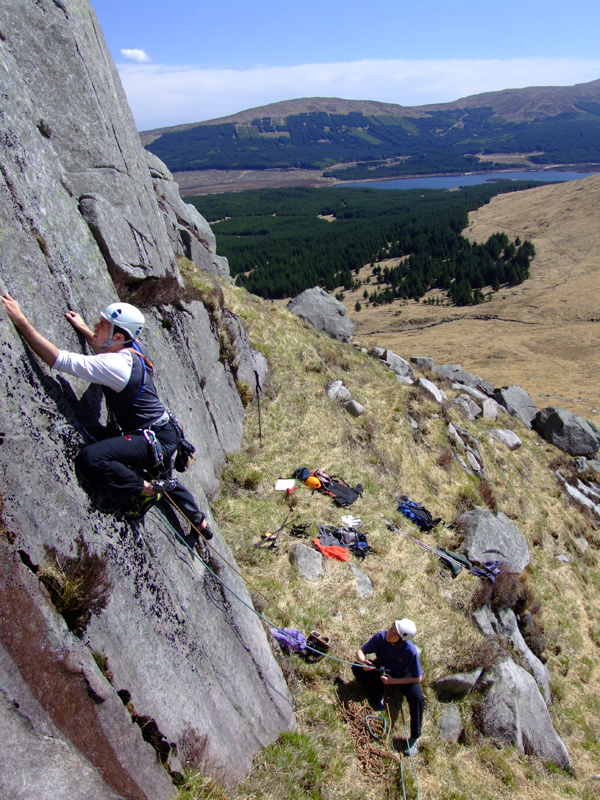 James Kinnaird 4m off the ground and already past the crux on Silver Sand, VS 5a, Snibe Hill.