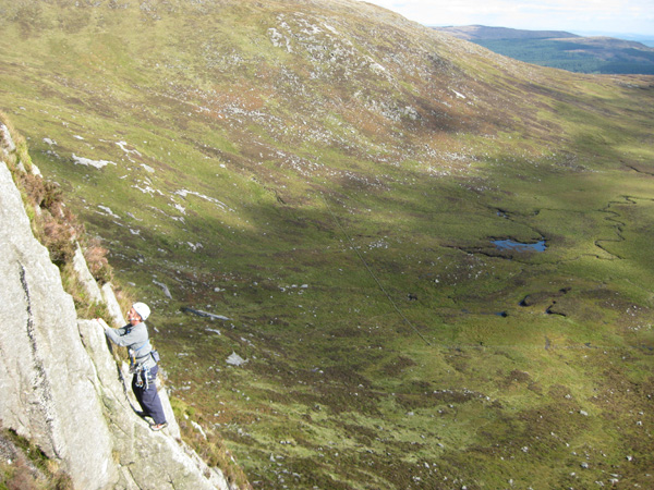 Splendid Isolation and a First Ascent. David MacNicol on easy ground between the cruxes on the excellent arte of The Sugar Loafers, Slab of the Spout.