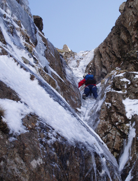 Linda Biggar on the crux grade III/IV pitch of the Black Gutter, left hand finish, March 24th 2008.