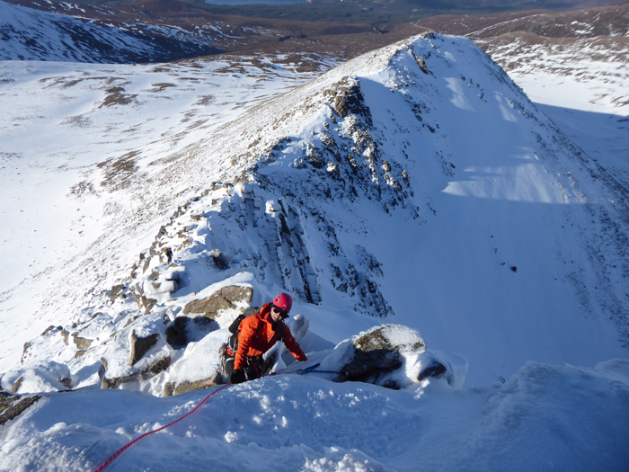 Climbing on the upper section of the Fiacll Ridge, Intro to Winter Mountaineerng Course by John Biggar. 