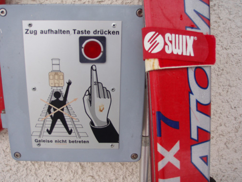 even when you are not skiing you are not safe - Swiss Railways sign seen at Madulain station.