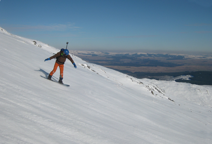 Sliding down teh southeast flank of Meikle Millyea after aa splitboard ascent. 