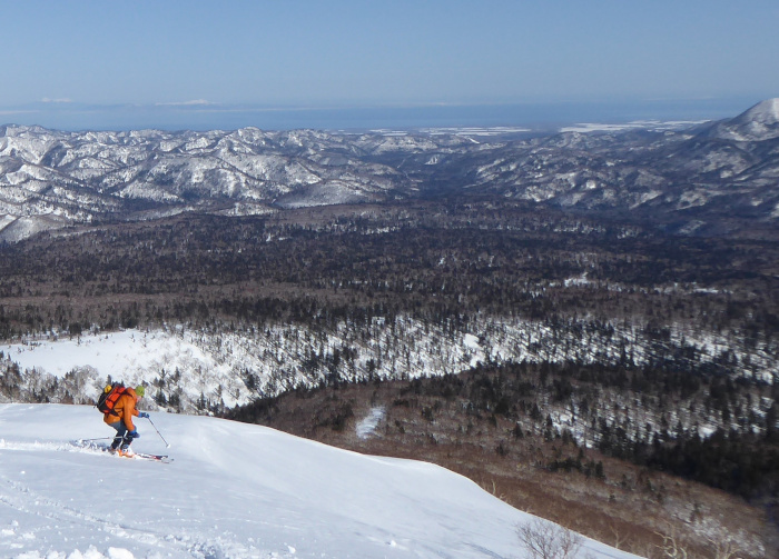 Skiing down Sharidake,  Shiretoko peninsual, Japan. 