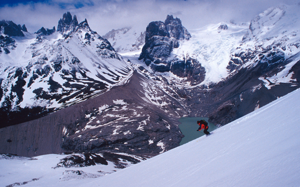 Skiing the peak of Glaciar Alto, San Lorenzo group, near Cochrane in Patagonia.
