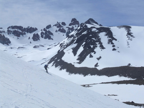 Chris skiing down from the Mirador del Sosneado.